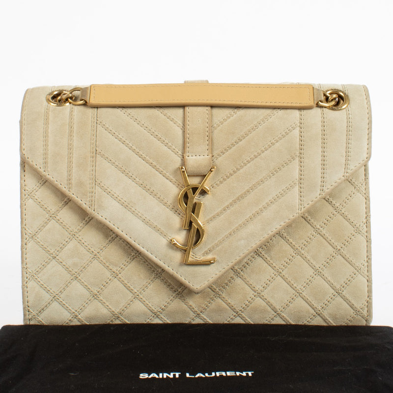 Shop the authentic Saint Laurent Beige Suede Medium Envelope Bag second hand on Labellov.com.