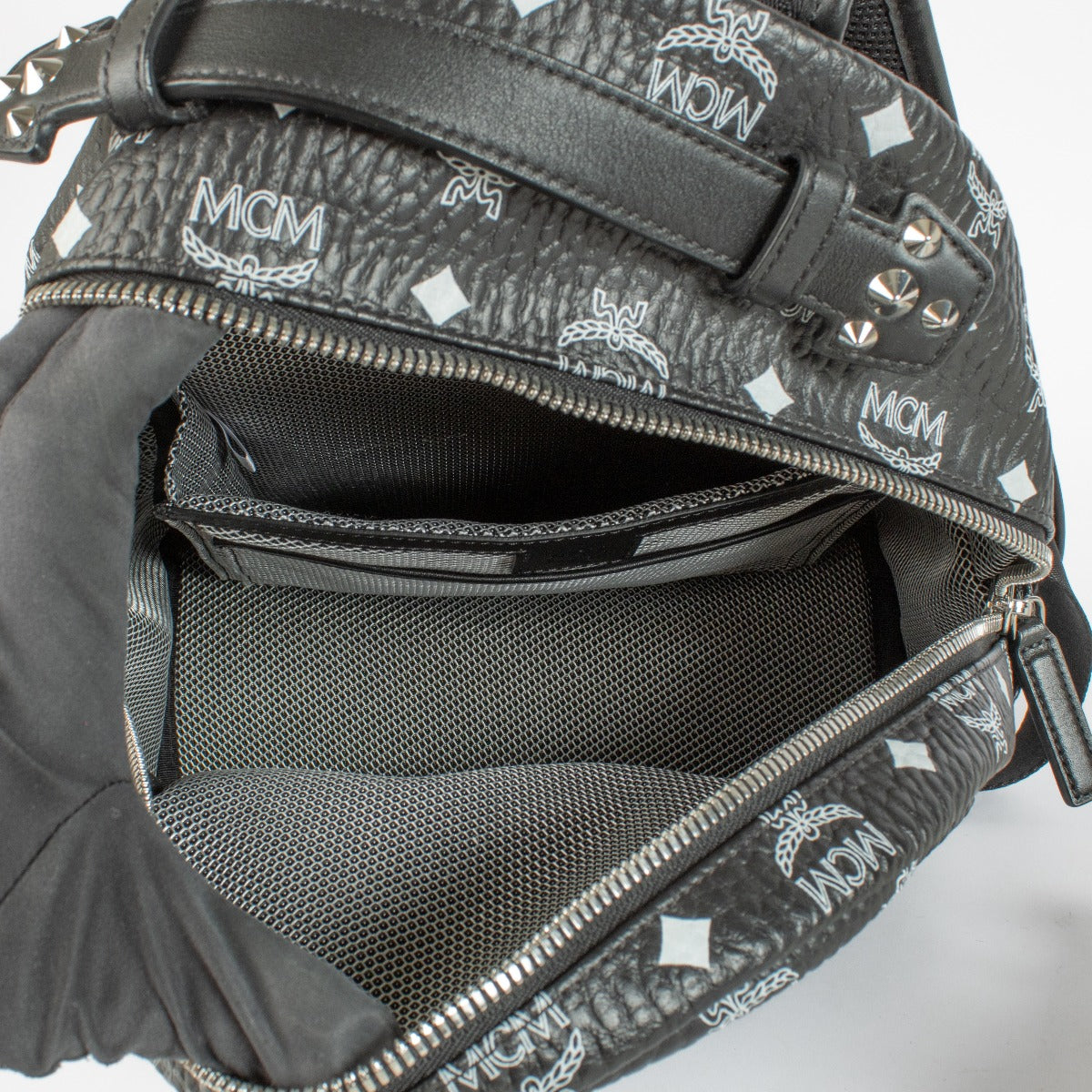 Authentic preloved MCM Black Monogram Backpack on Labellov.com