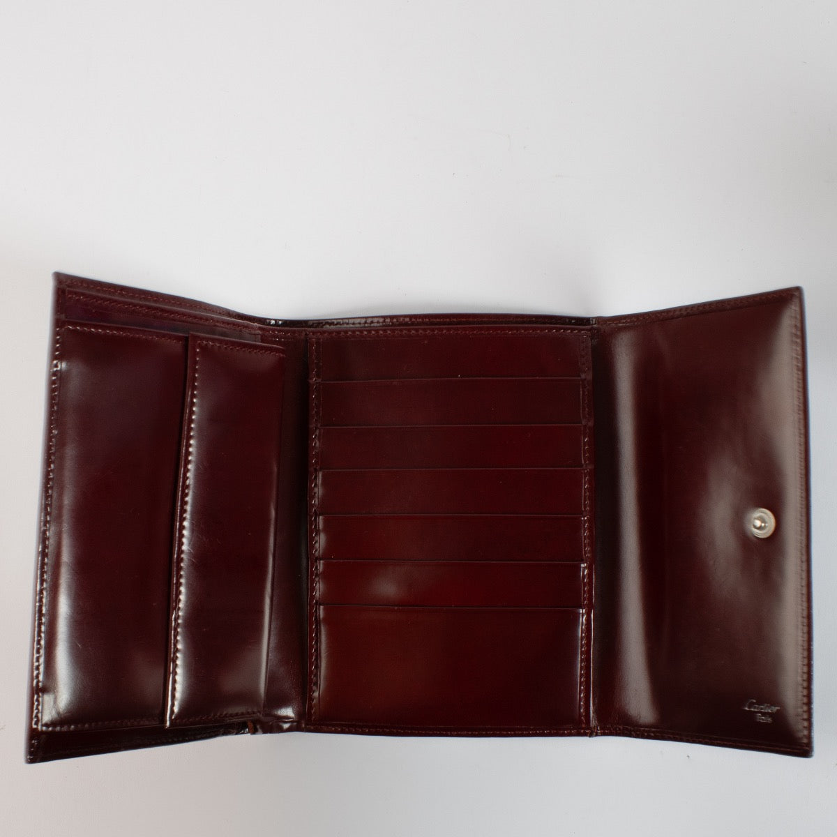 Authentic second hand Cartier Burgundy Leather Le Panthère de Cartier Wallet on Labellov.com