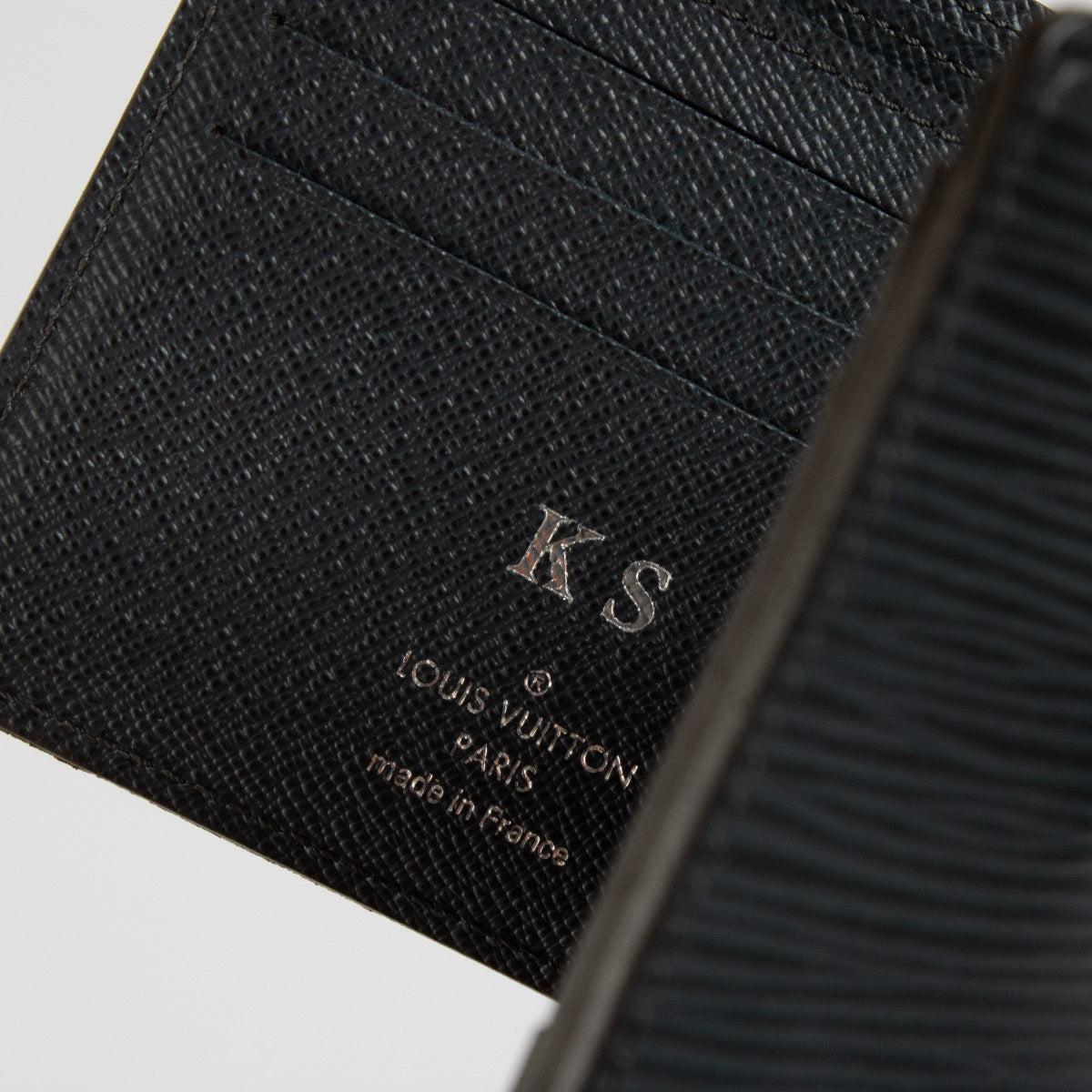 Authentic second hand Louis Vuitton Black Epi Leather Wallet on Labellov.com