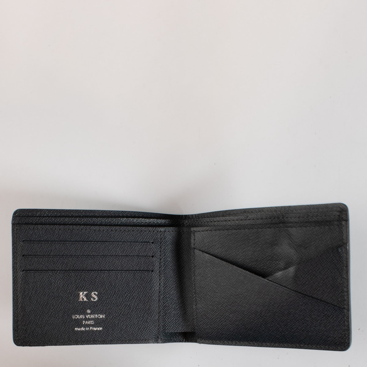 Authentic second hand Louis Vuitton Black Epi Leather Wallet on Labellov.com