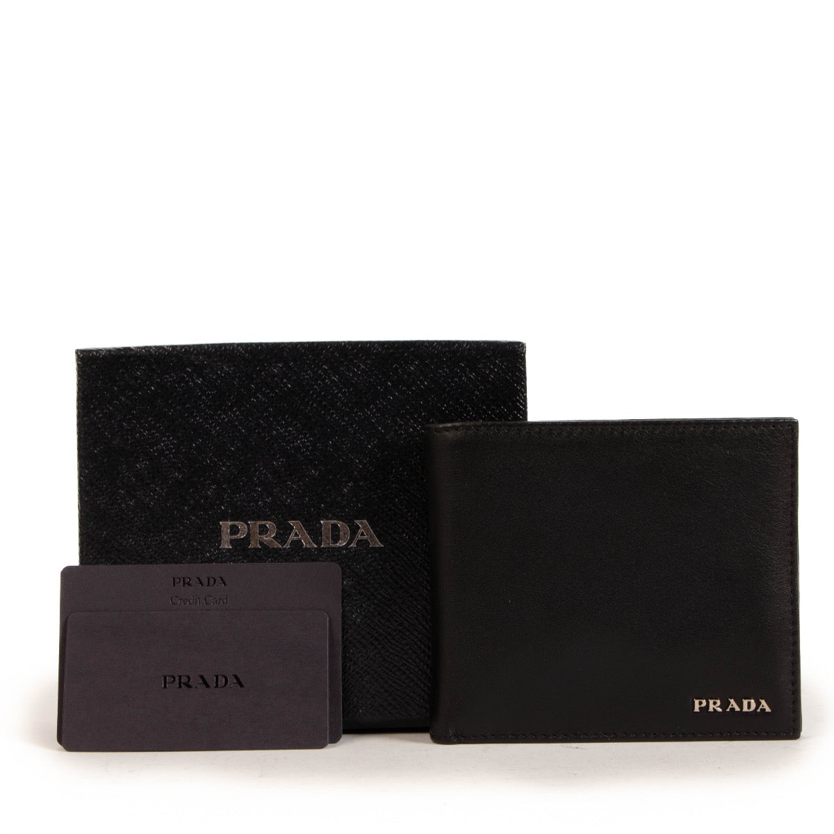 Shop safe online at Labellov in Antwerp, Brussels and Knokke this 100% authentic second hand Prada Black Leather Fold-over Wallet