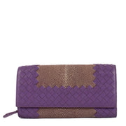 Shop safe online at Labellov in Antwerp, Brussels and Knokke this 100% authentic second hand Bottega Veneta Purple Galuchat Wallet. Veilig online authentieke tweedehands Bottega Veneta Purple Galuchat Wallet kopen bij Labellov.