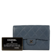 Chanel Denim Blue Leather Classic Wallet for the best price at Labellov secondhand luxury in Antwerp Brussels Knokke. We buy and sell your preloved designer bags online and in store.