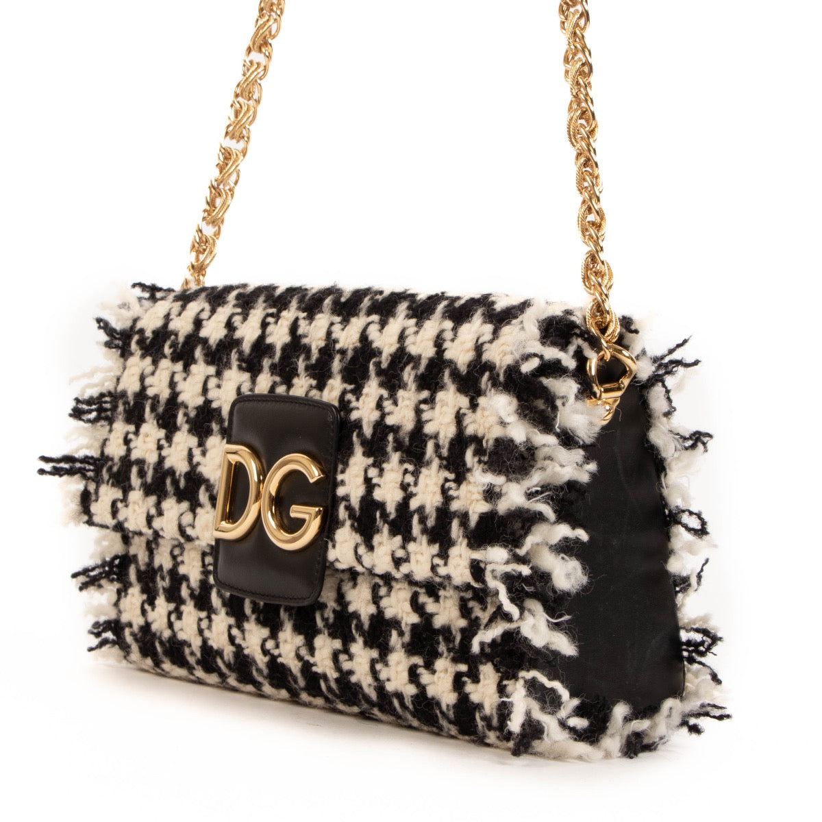 Shop safe online at Labellov in Antwerp, Brussel and Knokke this 100% authentic second hand Dolce & Gabbana black and white tweed Crossbody