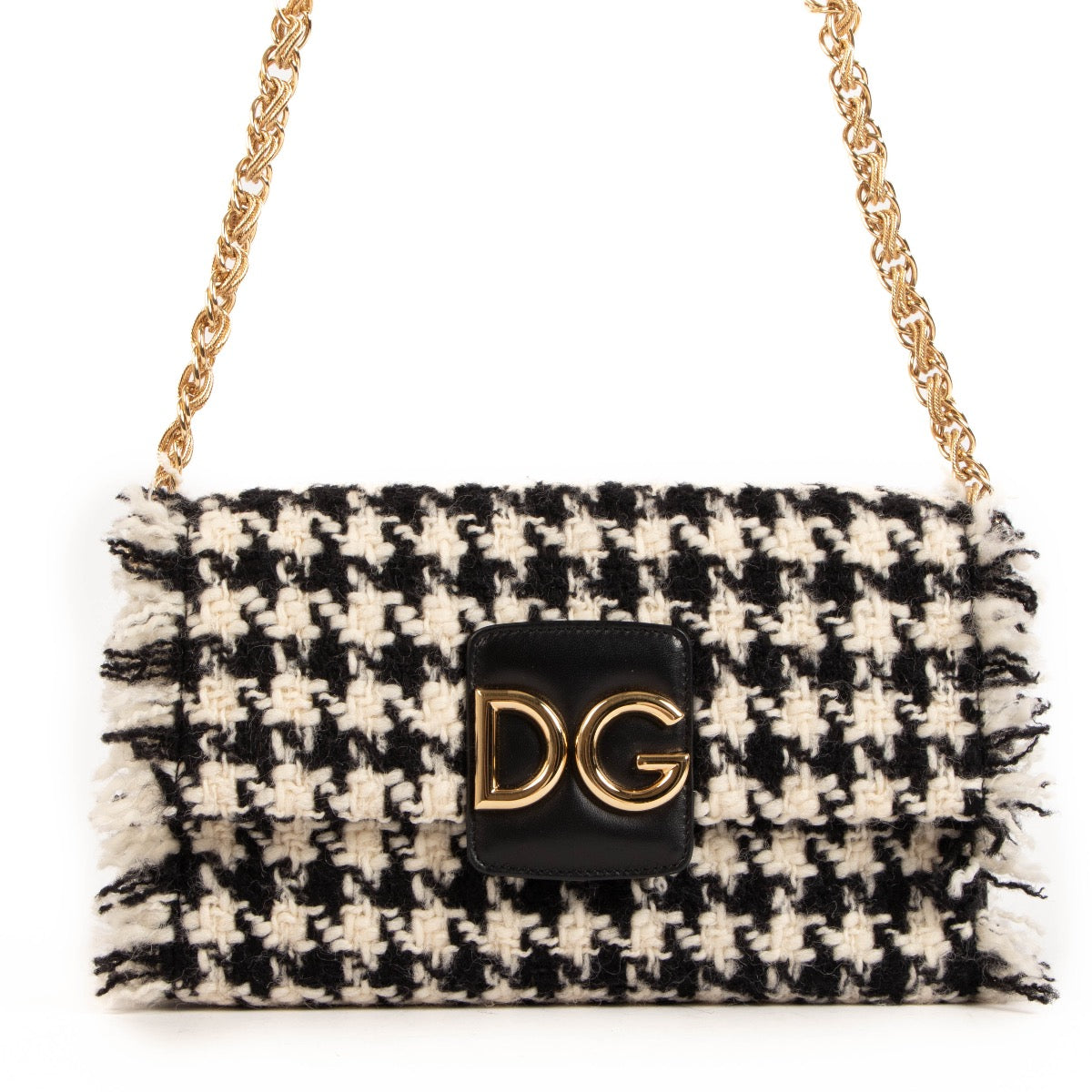 Shop safe online at Labellov in Antwerp, Brussel and Knokke this 100% authentic second hand Dolce & Gabbana black and white tweed Crossbody