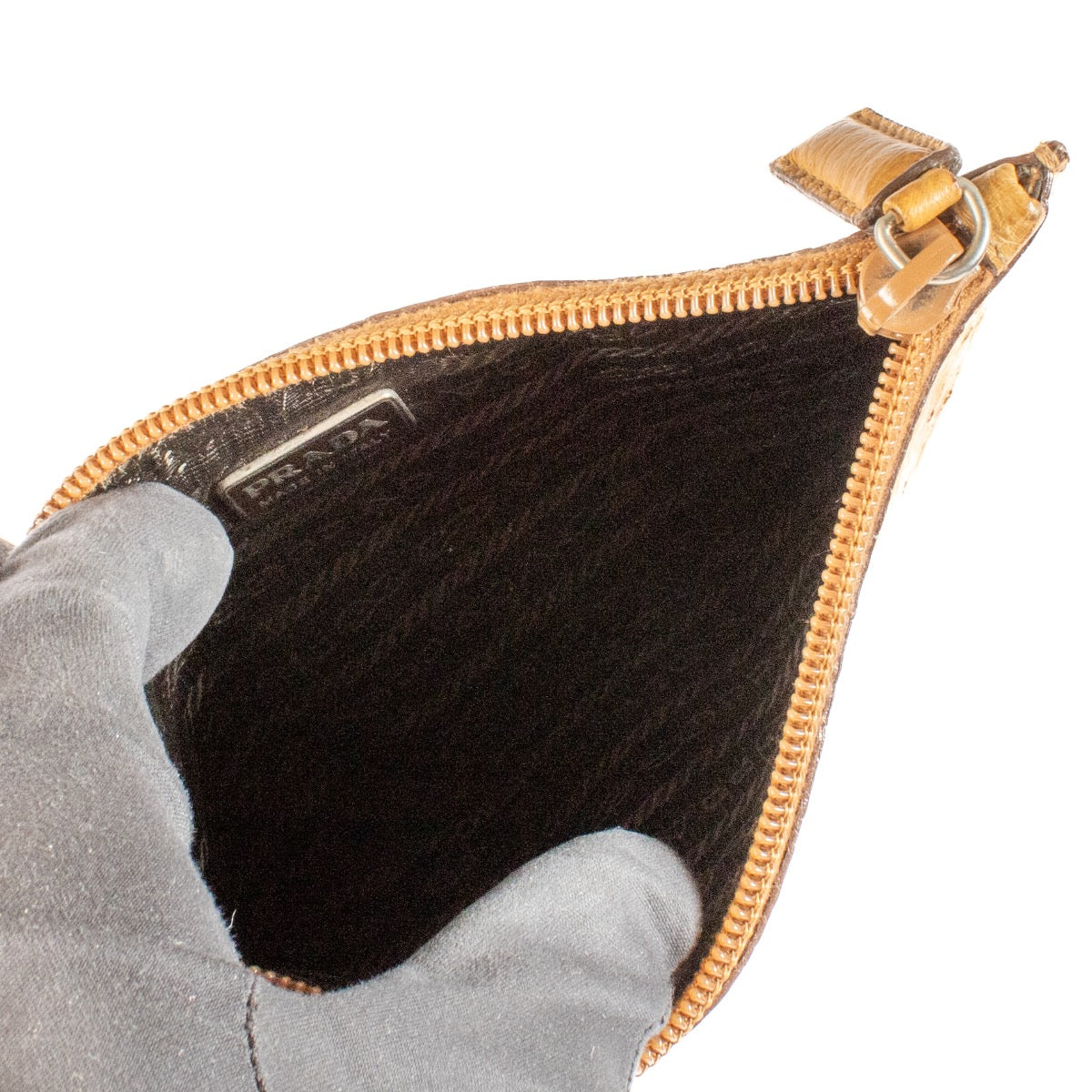 shop 100% authentic second hand Prada Camel Ostrich Pouch on Labellov.com
