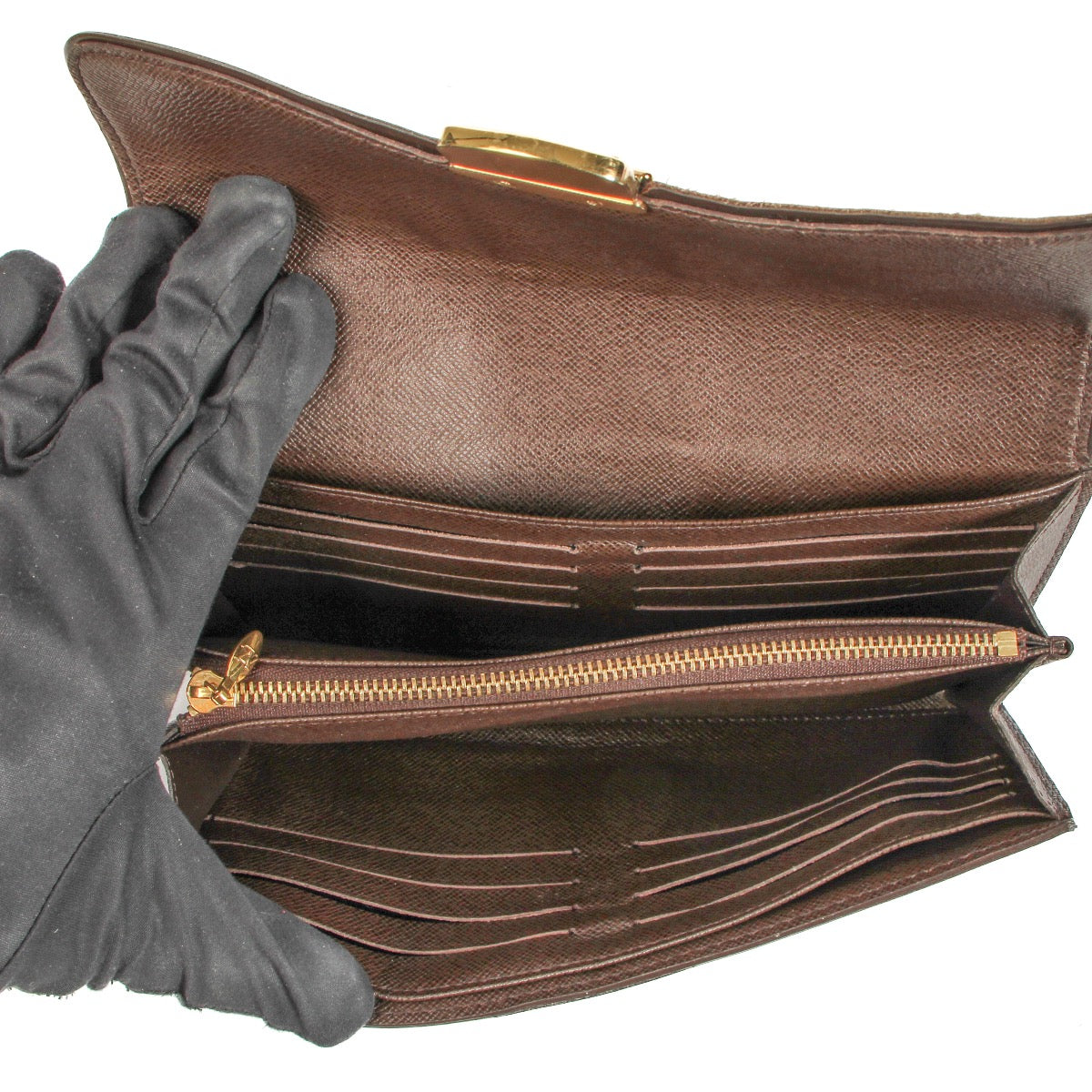 Shop and sell your authentic designer Louis Vuitton Brown Damier Ebene Wallet for the best price
