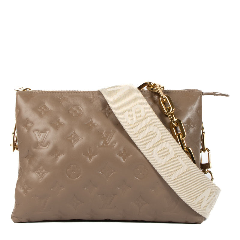 Shop safe online at Labellov in Antwerp, Brussels and Knokke this 100% authentic second hand Louis Vuitton Taupe Coussin PM Bag