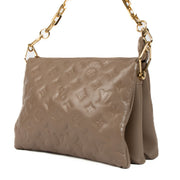 Shop safe online at Labellov in Antwerp, Brussels and Knokke this 100% authentic second hand Louis Vuitton Taupe Coussin PM Bag