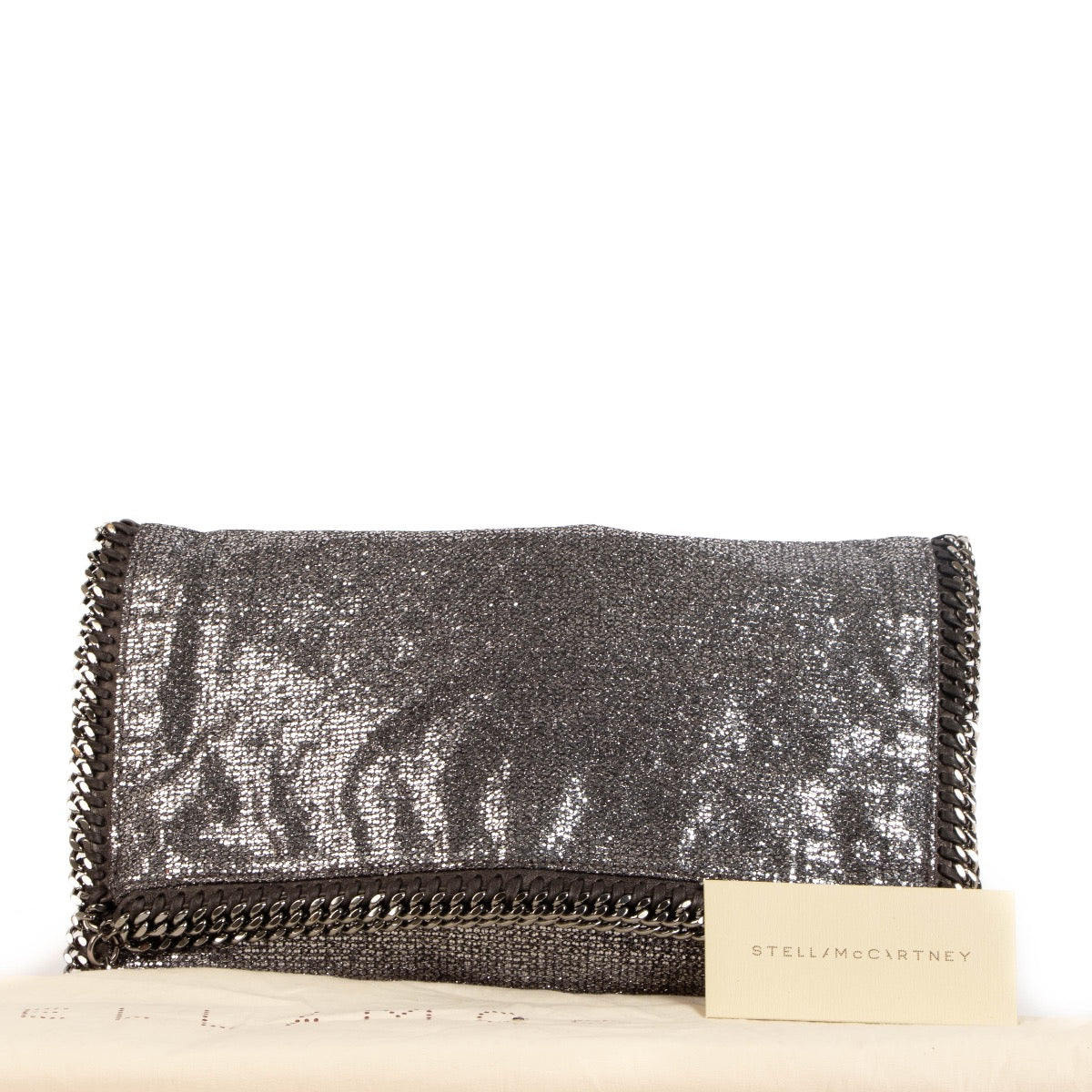 Shop safe online at Labellov in Antwerp, Brussels and Knokke this 100% authentic second hand Stella McCartney Silver Falabella Clutch