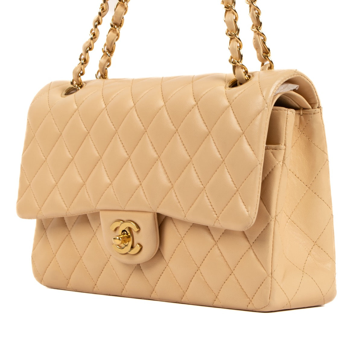Shop safe online at Labellov in Antwerp, Brussel and Knokke this 100% authentic second hand Chanel Beige Lambskin Medium Classic Bag