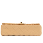 Shop safe online at Labellov in Antwerp, Brussel and Knokke this 100% authentic second hand Chanel Beige Lambskin Medium Classic Bag