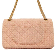 Shop safe online at Labellov in Antwerp, Brussels and Knokke this 100% authentic second hand Chanel Pink Tweed Medium 2.55 Reissue