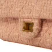 Shop safe online at Labellov in Antwerp, Brussels and Knokke this 100% authentic second hand Chanel Pink Tweed Medium 2.55 Reissue