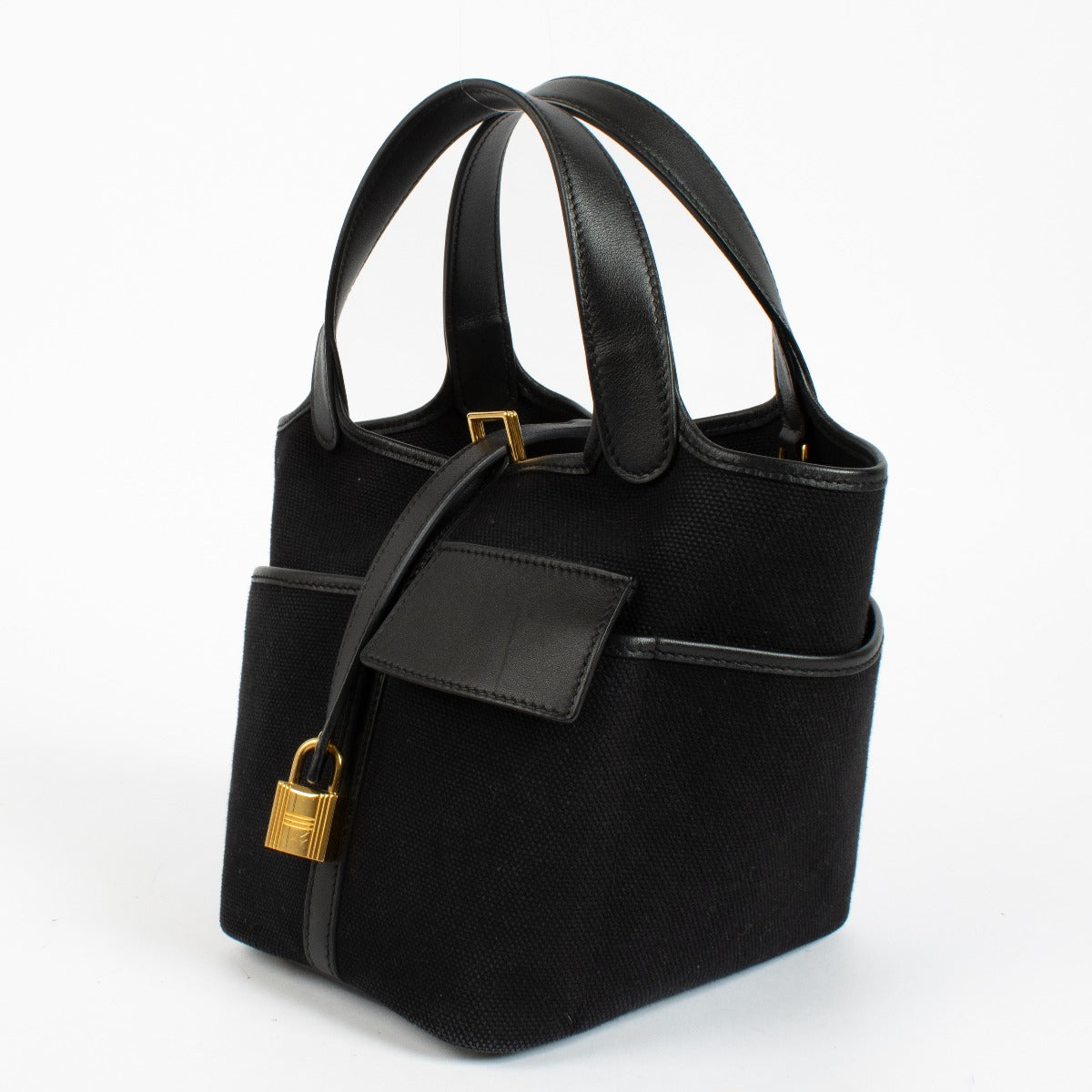 Authentic pre-loved Hermès Picotin Lock 18 Cargo Black Toile Goeland/Swift GHW on Labellov.com