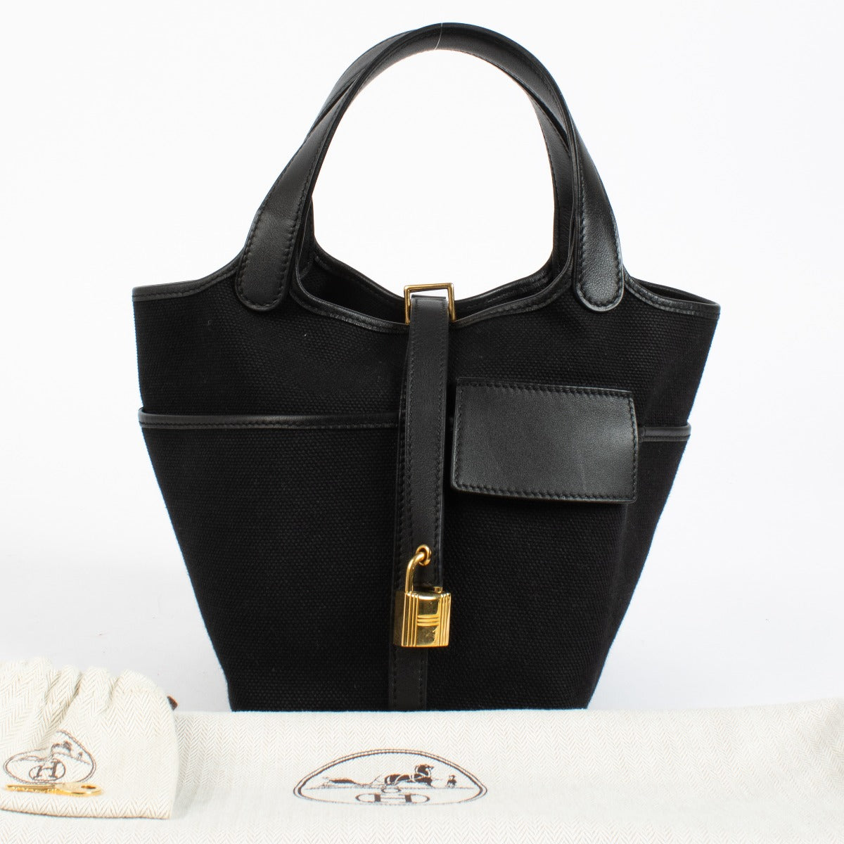 Authentic pre-loved Hermès Picotin Lock 18 Cargo Black Toile Goeland/Swift GHW on Labellov.com
