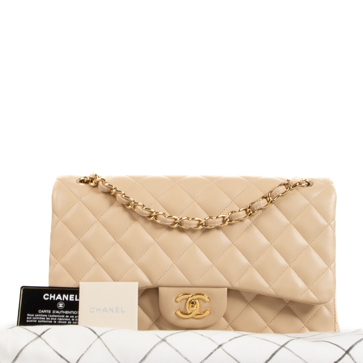 Shop safe online at Labellov in Antwerp, Brussels and Knokke this 100% authentic second hand Chanel Beige Lambskin Large Classic Flap Bag