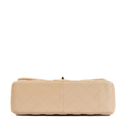 Shop safe online at Labellov in Antwerp, Brussels and Knokke this 100% authentic second hand Chanel Beige Lambskin Large Classic Flap Bag