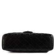 Shop 100% authentic second-hand Chanel Black Lambskin Maxi Classic Single Flap Bag on Labellov.com