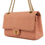 Shop safe online at Labellov in Antwerp, Brussels and Knokke this 100% authentic second hand Chanel Pink Chevron Goat Skin 2.55 Bag