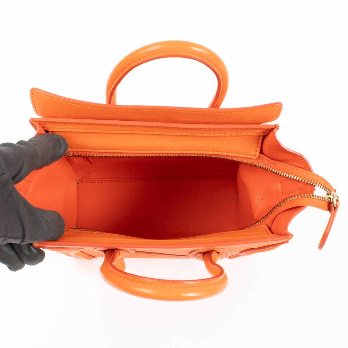 Shop safe online at Labellov in Antwerp, Brussels and Knokke this 100% authentic second hand Celine Orange Luggage Nano Top handle