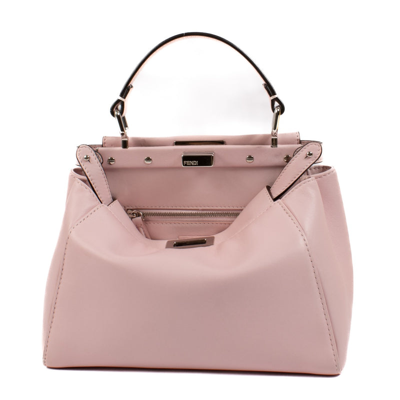 Fendi Pink Nappa Mini Peekaboo Bag in the color rose sakura available exclusively at Labellov secondhand luxury. We buy and sell your preloved and brand new designer bags such as this stunning pastel pink Fendi Pink Nappa Mini Peekaboo Bag.