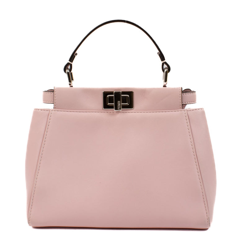 Fendi Pink Nappa Mini Peekaboo Bag in the color rose sakura available exclusively at Labellov secondhand luxury. We buy and sell your preloved and brand new designer bags such as this stunning pastel pink Fendi Pink Nappa Mini Peekaboo Bag.