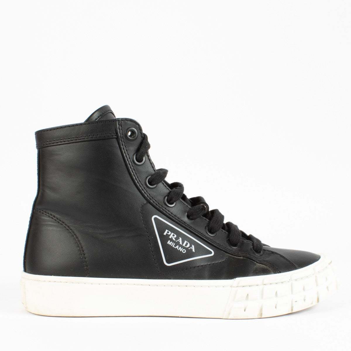 shop 100% authentic second hand Prada Black Triangle Logo Sneakers - Size 39 on Labellov.com