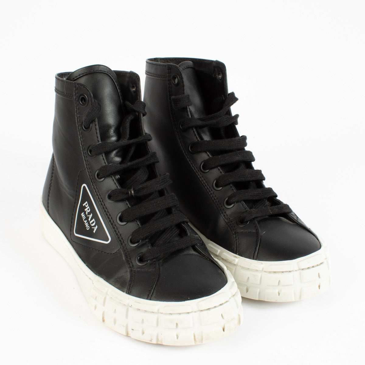 shop 100% authentic second hand Prada Black Triangle Logo Sneakers - Size 39 on Labellov.com