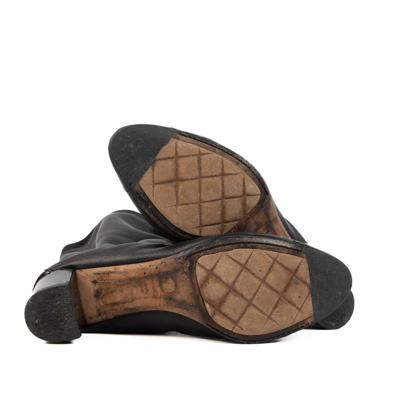 Shop 100% authentic second-hand Chanel Black Leather Boots - Size 39 on Labellov.com