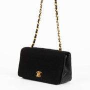 Shop this authentic Chanel Black/Jersey Leather Mini Flap Bag pre-loved on Labellov.com
