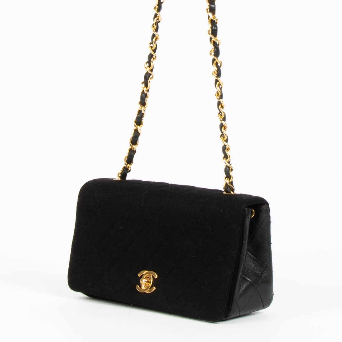 Shop this authentic Chanel Black/Jersey Leather Mini Flap Bag pre-loved on Labellov.com
