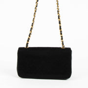 Shop this authentic Chanel Black/Jersey Leather Mini Flap Bag pre-loved on Labellov.com