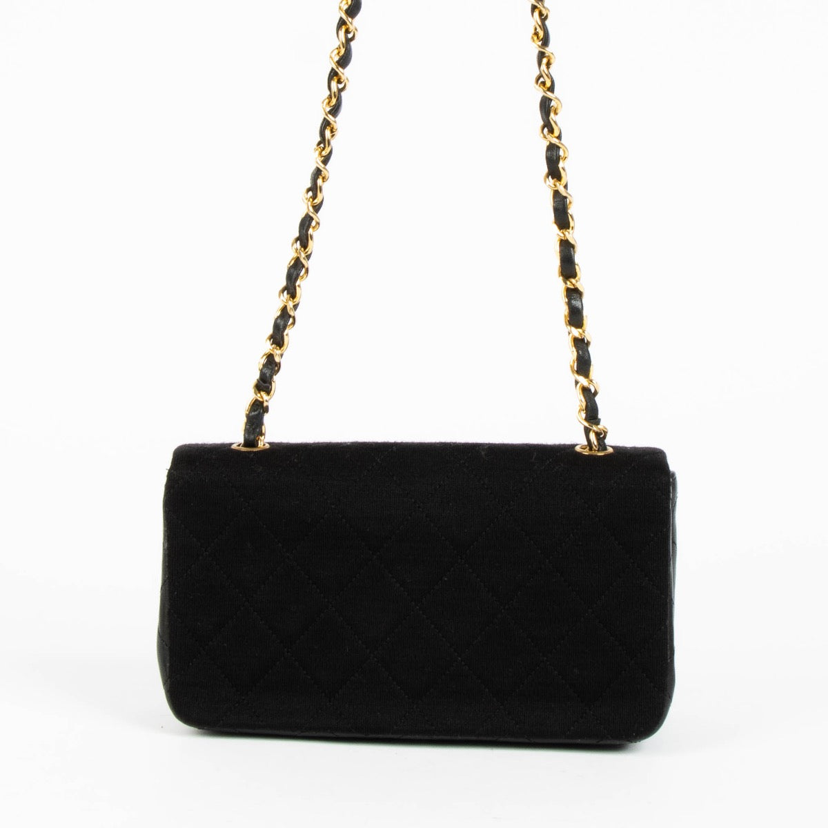 Shop this authentic Chanel Black/Jersey Leather Mini Flap Bag pre-loved on Labellov.com