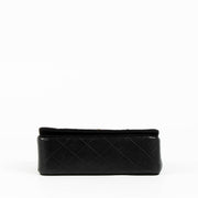 Shop this authentic Chanel Black/Jersey Leather Mini Flap Bag pre-loved on Labellov.com