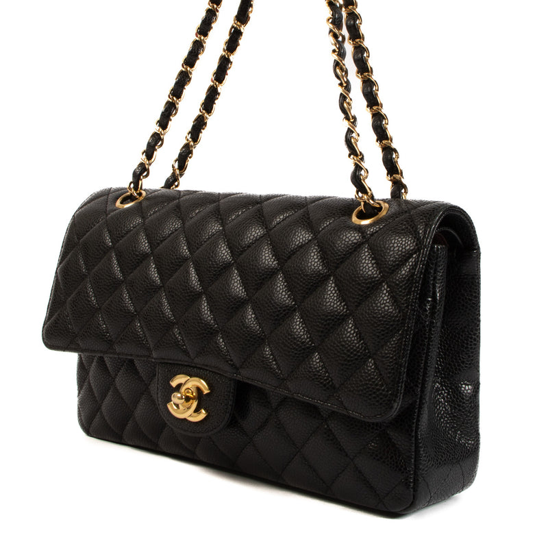 Chanel Black Caviar Leather Medium Classic Flap Bag GHW Crafted with meticulous attention to detail, this iconic piece showcases the perfect harmony between sophistication and practicality, making it a must-have accessory for the modern fashion connois