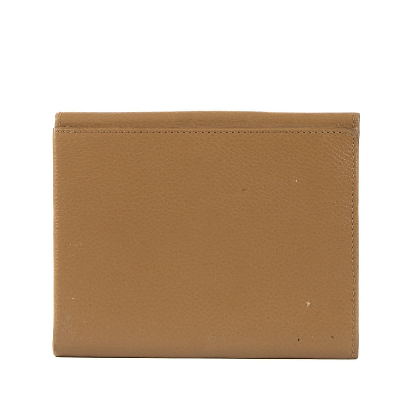 Shop 100% authentic second-hand Delvaux Beige Leather Flap Wallet on Labellov.com