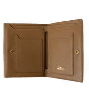 Shop 100% authentic second-hand Delvaux Beige Leather Flap Wallet on Labellov.com