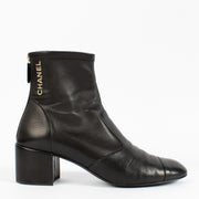 Shop 100% authentic second hand Chanel Black Boots on Labellov.com