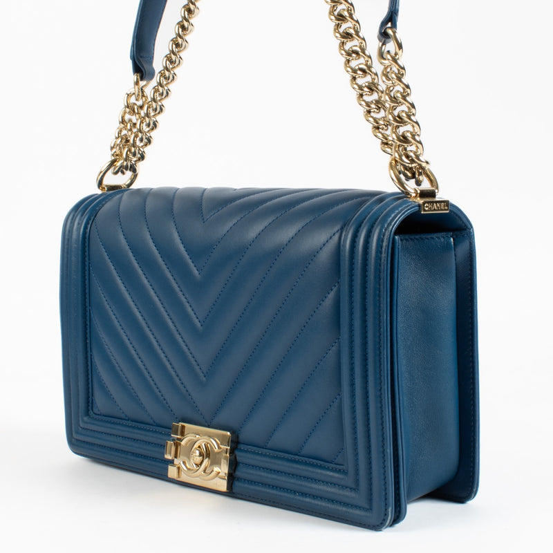 Shop 100% authentic second hand Chanel Blue Chevron Boy Bag on Labellov.com