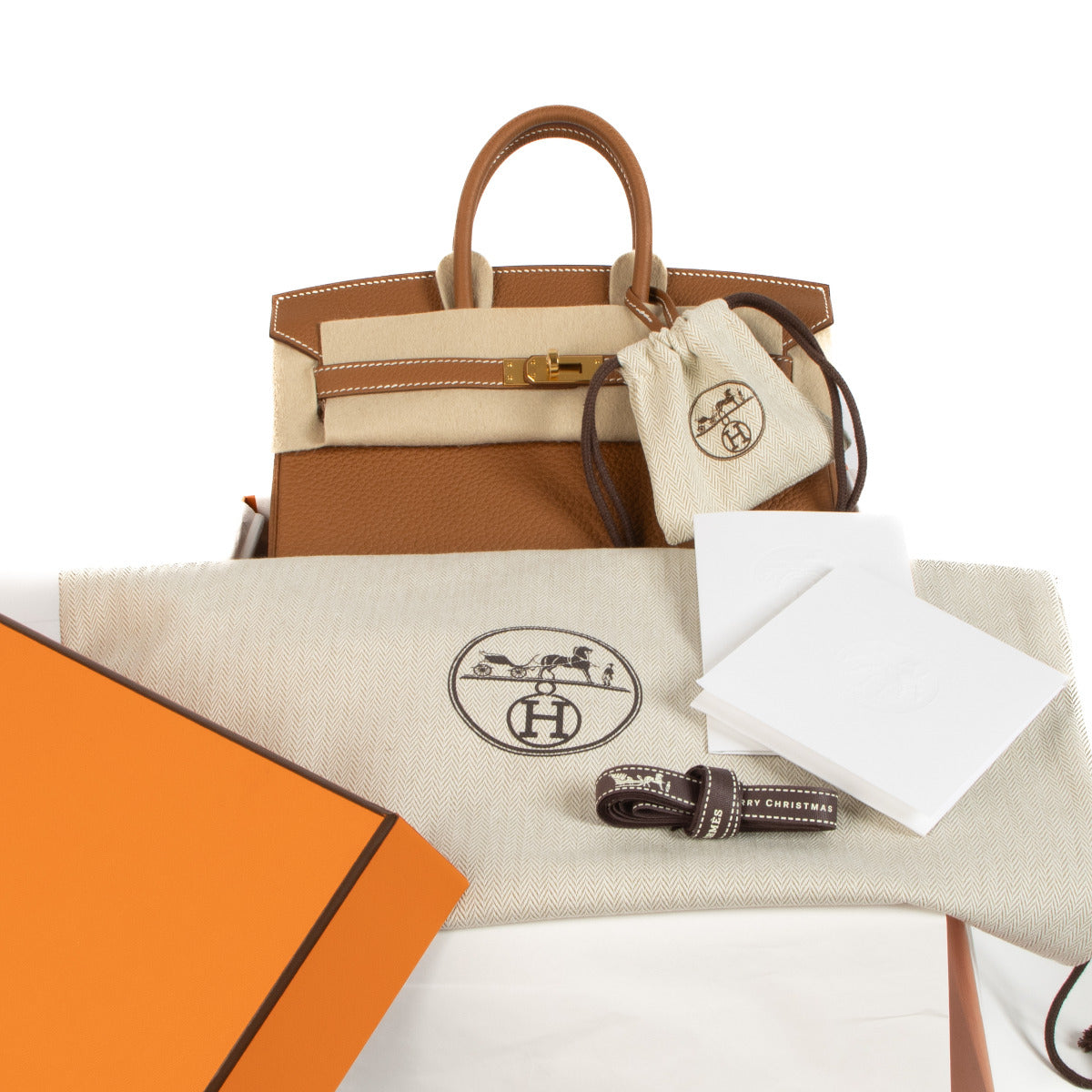 Hermès Birkin 25 Gold Togo GHW for the best price at Labellov secondhand luxury in Antwerp, Knokke, Brussels. We buy and sell your preloved designer bags for the best price.