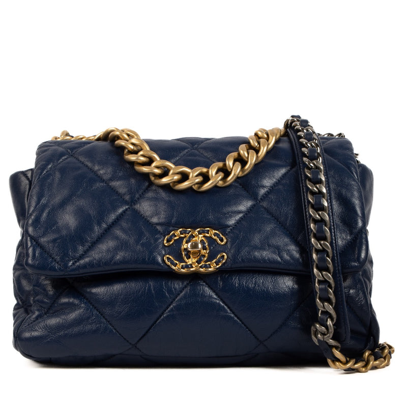 Shop safe online at Labellov in Antwerp, Brussels and Knokke this 100% authentic second hand Chanel Blue Shiny Goatskin Crossbody Medium 19 Crossbody