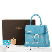Shop authentic second hand Delvaux Brillant L'Humour MM Ceci N'est Pas Un Delvaux René Magritte on www.labellov.com