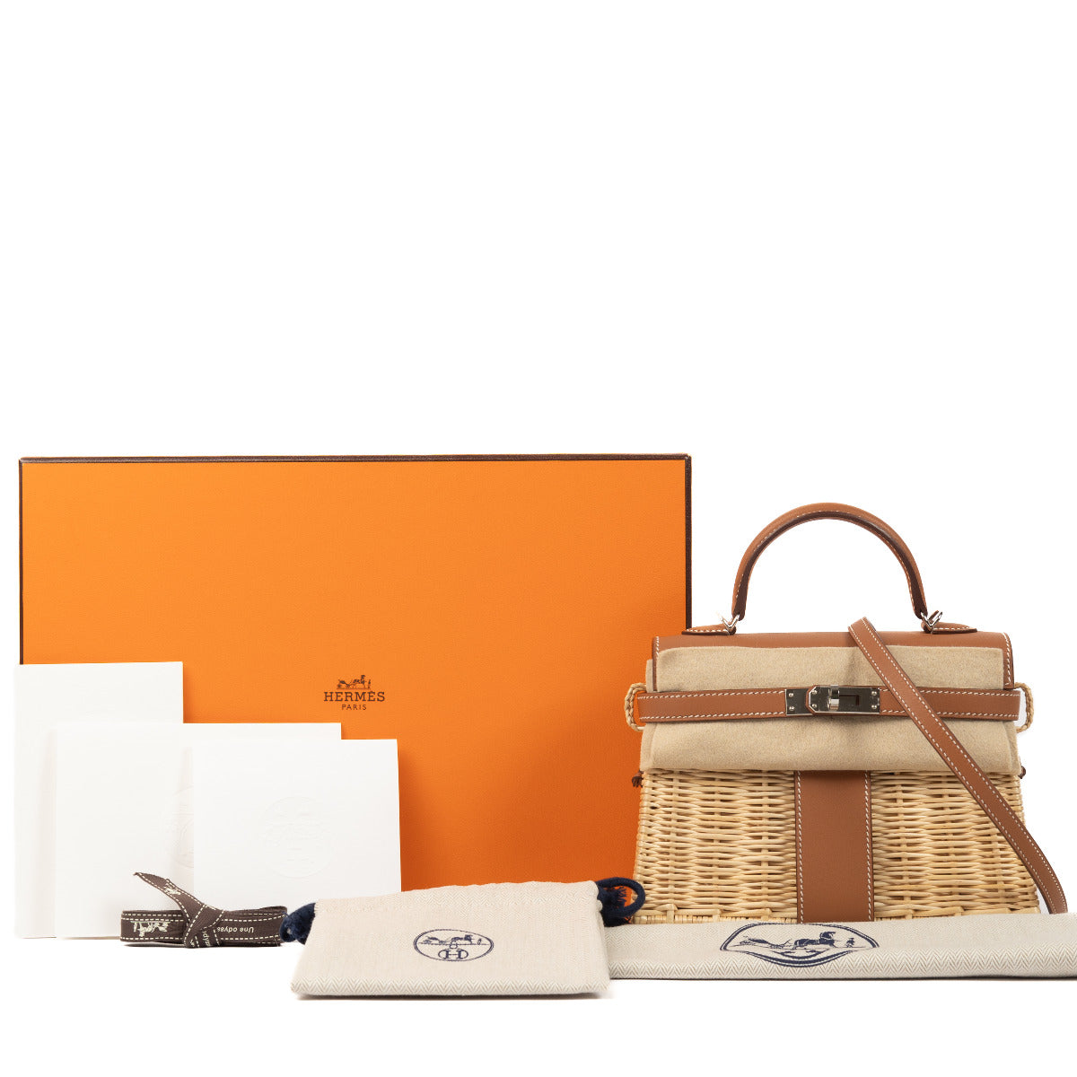 Exclusive store-fresh full set completely new Hermes Mini Kelly Picnic in wicker and gold swift leather. With palladium hardware.