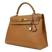 Seconde main vintage Hermès Kelly Sellier 32 Naturel Sable Veau Ardennes dans www.labellov.com