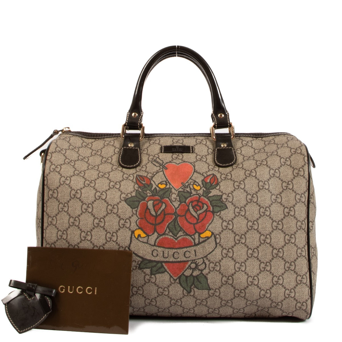 Shop safe online at Labellov in Antwerp, Brussels and Knokke this 100% authentic second hand Gucci Tattoo Heart Medium Joy Boston Bag