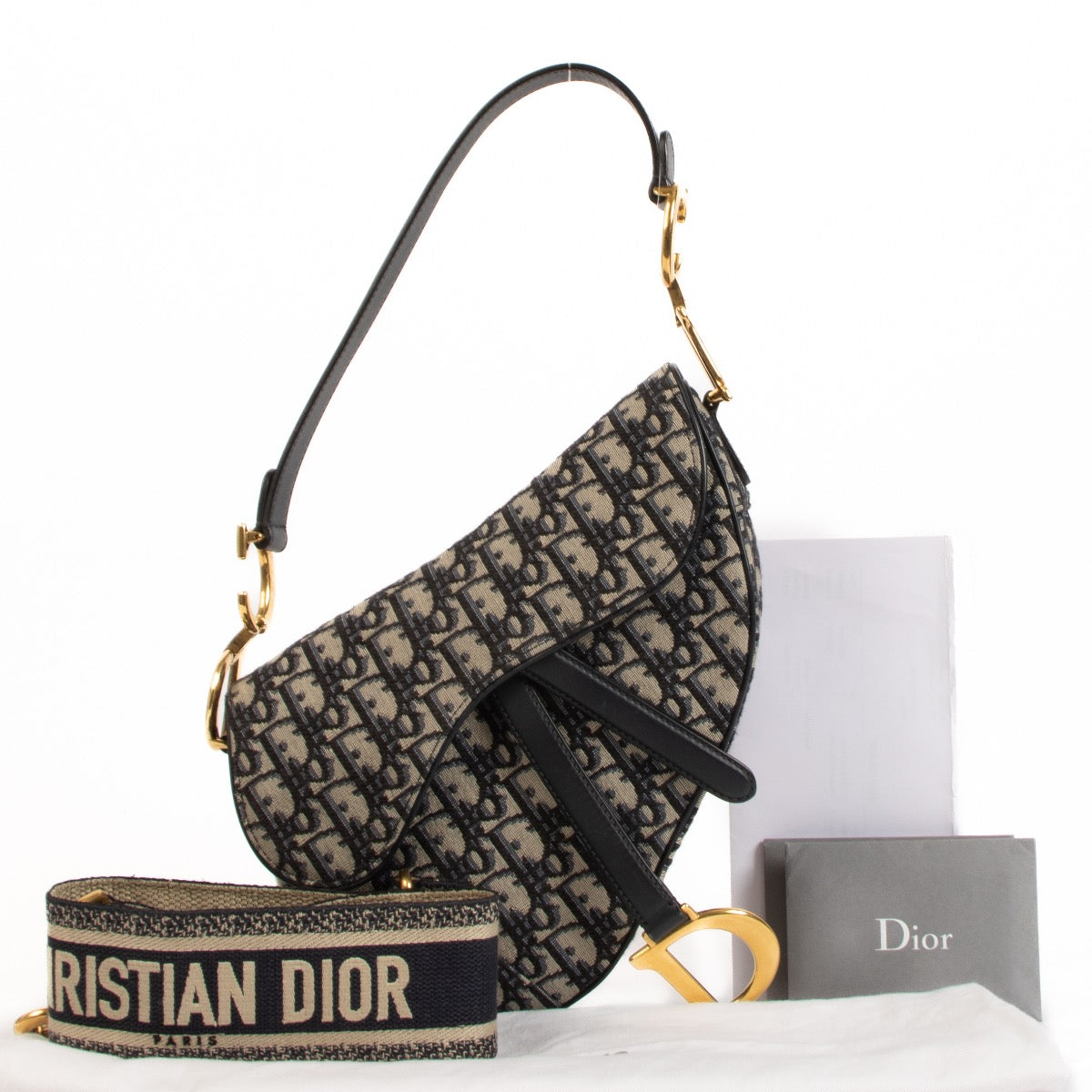 Shop safe online at Labellov in Antwerp, Brussels and Knokke this 100% authentic second hand Christian Dior Blue Oblique-jacquard Saddle Bag + Strap