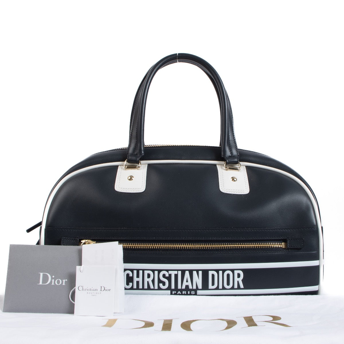 Shop safe online at Labellov in Antwerp, Brussels and Knokke this 100% authentic second hand Christian Dior Blue Leather Vibe Bowling Bag