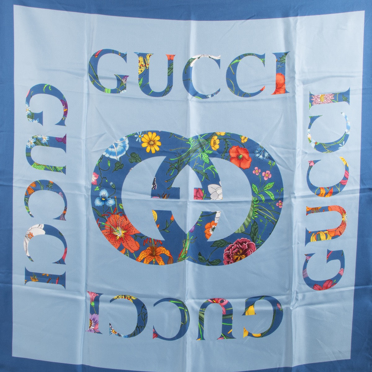 Shop safe online at Labellov in Antwerp, Brussels and Knokke this 100% authentic second hand Gucci Blue Floral Silk Scarf